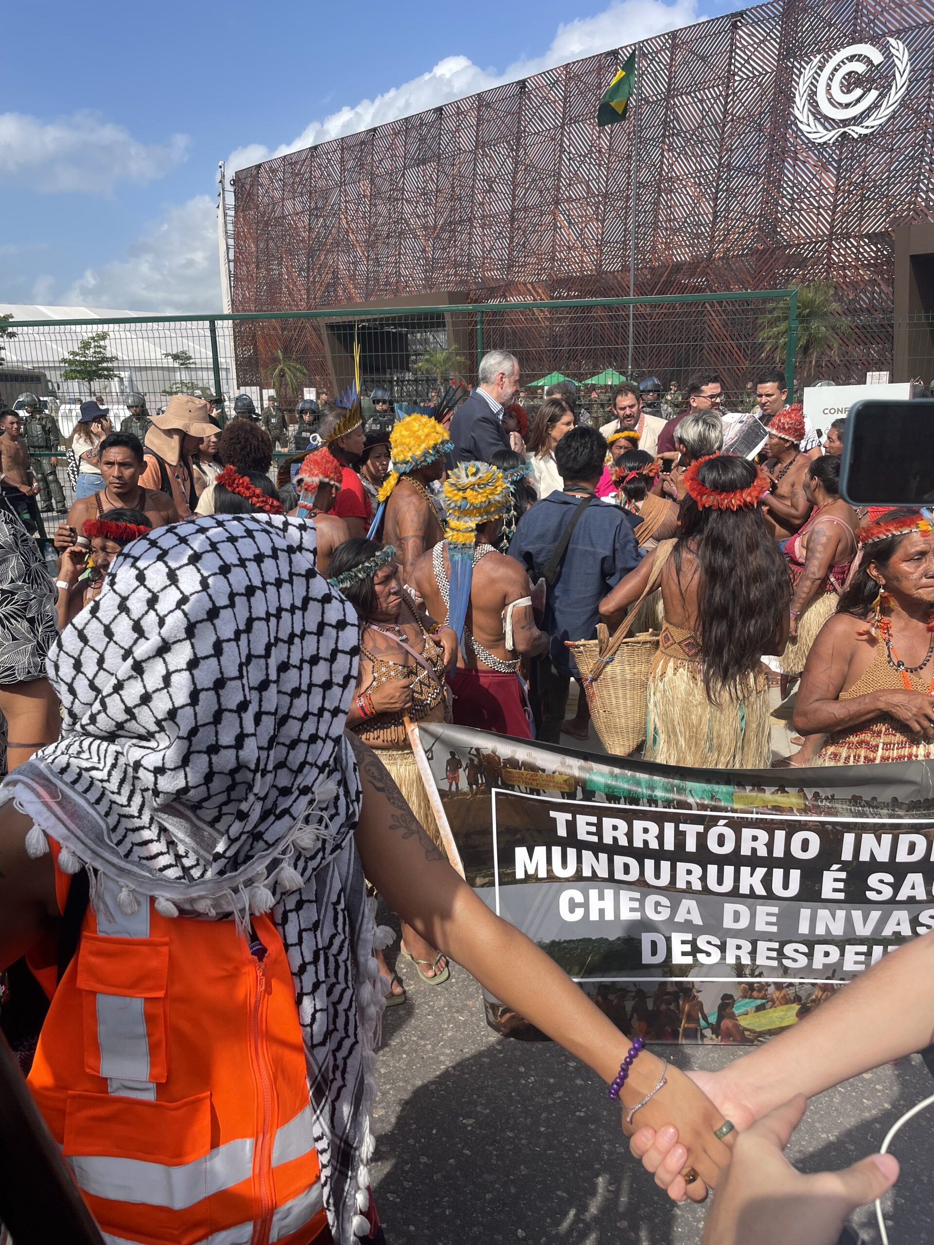 Hey Max Planck! You can help us and join the line: On badges and the politics of visibility at COP30